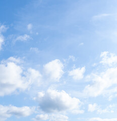 Fototapeta premium Low angle view and full frame of beautiful blue sky with strange shape of thin fluffy white clouds in the afternoon on sunny day used as natural background texture in decorative art work