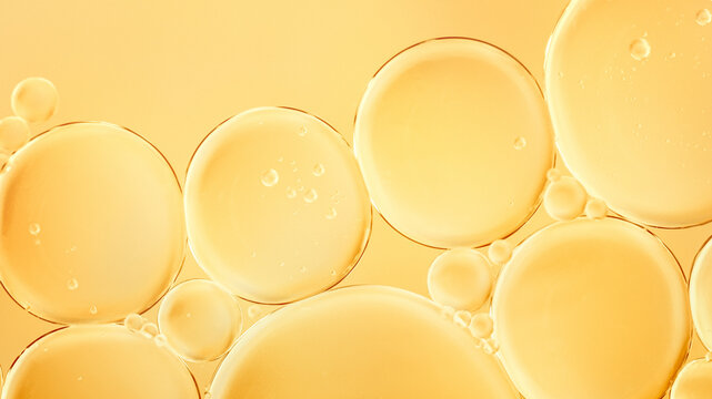 Luxury gold oil bubbles macro texture background with copy space