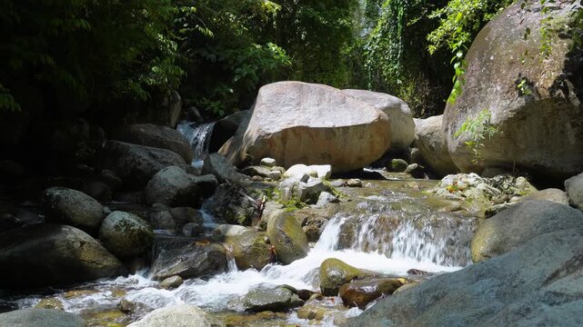 Rocky Tropical River Cascade With Giant Boulder 4K