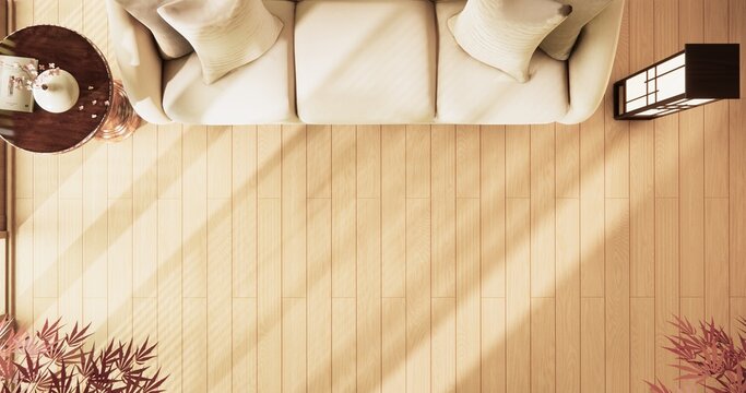 Japanese room viewed from above with sofa set placed on wood flooring and sunlight streamed in room.3D rendering