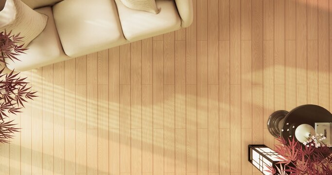 Japanese room viewed from above with sofa set placed on wood flooring and sunlight streamed in room.3D rendering