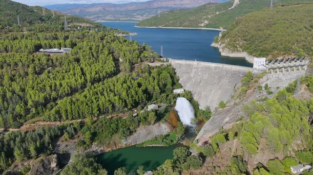Aerial view of Talarn dam and low water levels at Panta de Sant Antoni reservoir in Spanish Pyrenees, Lleida, Spain