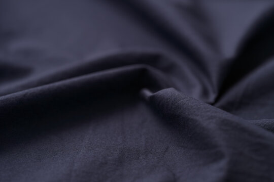 Closeup photo of blue cotton fabric for clothing