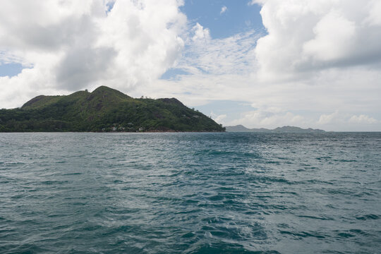 Side view from boat in Indian ocean sailing between Seychelles islands in daytime