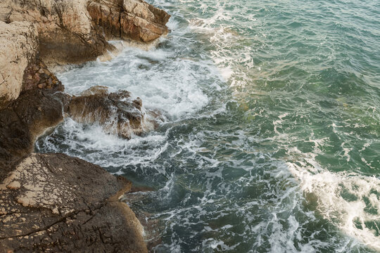 Fresnch Riviera cliffs with sea waves crushing on them