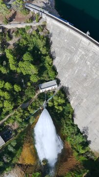Aerial view of Talarn dam and low water levels at Panta de Sant Antoni reservoir in Spanish Pyrenees, Lleida, Spain