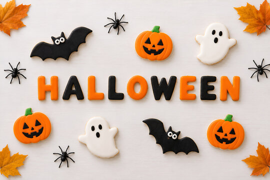 Halloween Cookies with Pumpkins, Ghosts and Bats on a White Background