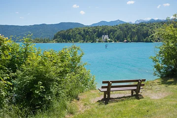 lookout place with bench, lake Walchensee with wing surfer. bavarian alps landscape © SusaZoom
