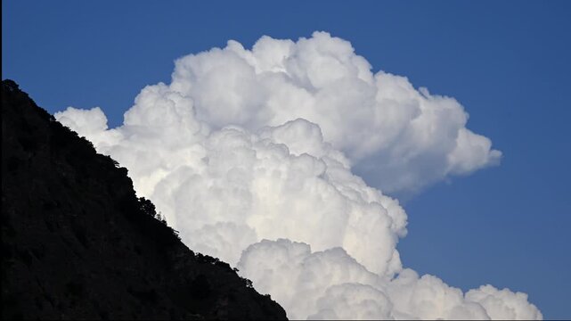Timelapse of large cloud formation and storm brewing over Pyrenees mountains, Ordesa National Park, Spain