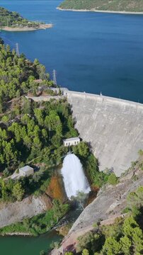 Aerial view of Talarn dam and low water levels at Panta de Sant Antoni reservoir in Spanish Pyrenees, Lleida, Spain