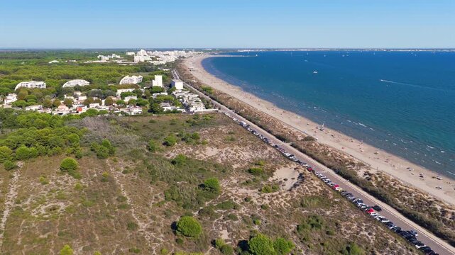 Aerial view of people swimming and relaxing on the beach in La Grande-Motte, H&eacute;rault, South of France