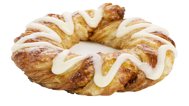 Golden flaky danish pastry ring with sweet white icing drizzle