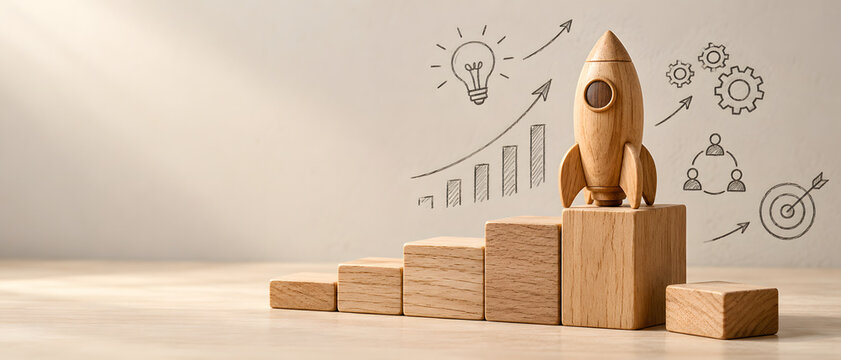 Startup, business growth and wooden rocket on staircase for innovation, strategy and success. Achievement, goal and creative planning with sketches for launch, development and corporate leadership