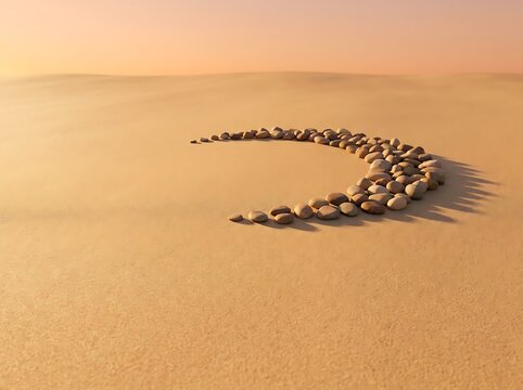 Pebbles arranged in crescent moon shape on desert sand dunes.