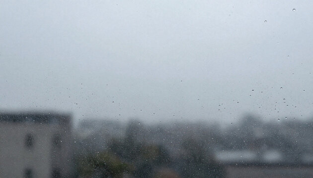 Rain covered glass with a quiet upper area
