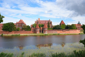 Malbork, Poland. A 14th-century Teutonic castle housing a museum of medieval artifacts, paintings, and amber collections. © skorpionik00