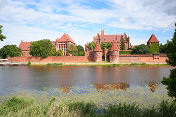Malbork, Poland. A 14th-century Teutonic castle housing a museum of medieval artifacts, paintings, and amber collections. © skorpionik00