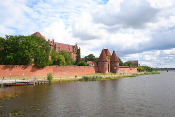 Malbork, Poland. A 14th-century Teutonic castle housing a museum of medieval artifacts, paintings, and amber collections. © skorpionik00