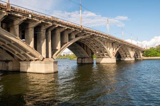 Voronezh, Russia, July 30, 2026: The Vogresovsky arch bridge across the Voronezh Reservoir in Voronezh in summer