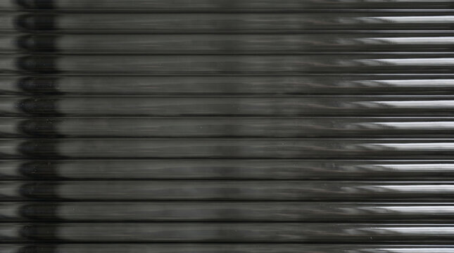 Smoke Gray Ribbed Glass Texture with Precise Horizontal Lines and Metallic Reflections