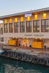 Fototapeta premium Lights On at Kadikoy Ferry Pier in Istanbul Turkey Dusk