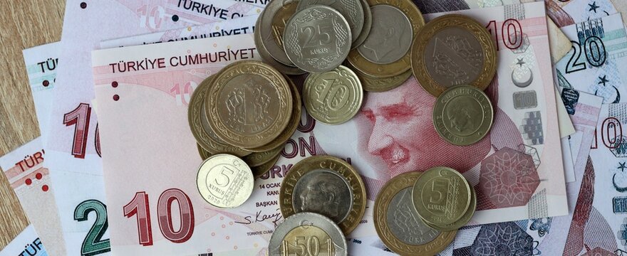 Turkish lira money bills and coins on table. Turkey cash of TRY currency close up