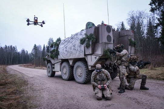 FPV drone flying past a French armoured column during multinational training in Tapa, Estonia