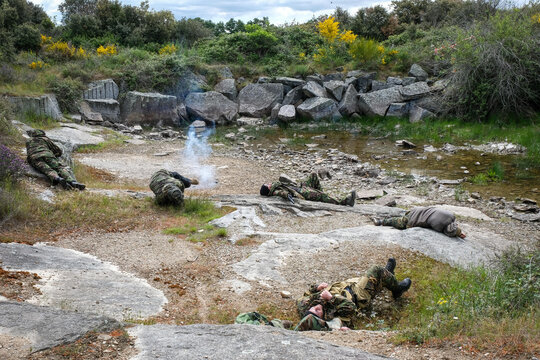 Airsoft player showing the strain after twenty four hours of play during a war game near Carcassonne, France