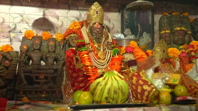 Maa Kot Bhramari Devi Idol Decorated with Flowers and Offerings, Uttarakhand Temple