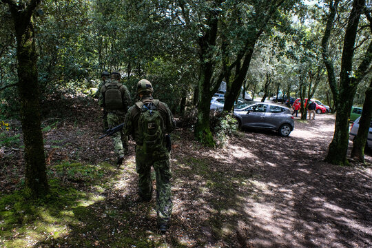 Airsoft players heading back towards their cars between two game phases near Carcassonne, France