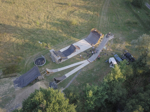 Aerial view of a private BMX dirt trail park in the farmland of Haute-Garonne, France