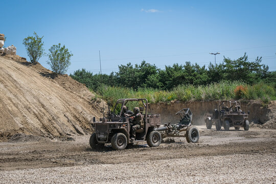 Towed artillery gun brought into the demonstration arena at a defence trade fair near Paris, France