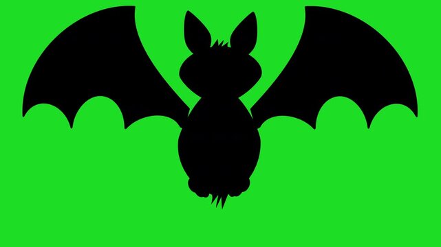 flying vampire bat. Cute furry animated Halloween silhouette cartoon with flapping wings & green screen chroma key background 4K friendly spooky animation isolated graphic for customisation