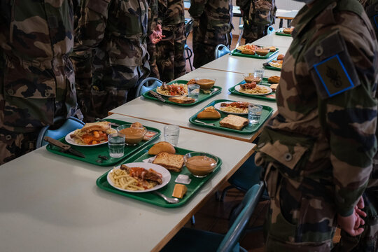 Trays lined up along a mess table at the Foreign Legion training regiment in Castelnaudary, France
