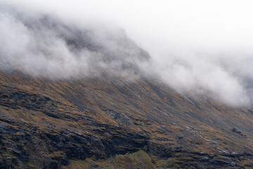 Scandinavian mountainside with rolling clouds, a moody scene high in the Swedish arctic © Jacob Hall