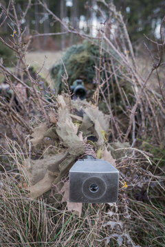 Spotting scope set up in the undergrowth by French paratrooper snipers training near Castres, France