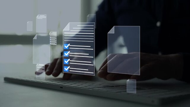 Businessman using a computer to complete digital documents, checklists and online survey forms. Business management, task tracking, workflow automation and workplace productivity concept.