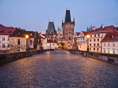 Charles Bridge and Lesser Town Bridge Tower at dawn in Prague
