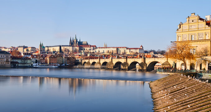 Charles Bridge and Prague Castle over the Vltava at sunrise