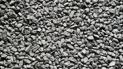 Top View of Crushed Grey Gravel Stones Texture Background © Yuliantini