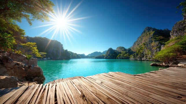 Wooden Dock Extending into Turquoise Tropical Ocean Waters Under Bright Sun and Lush Green Islands