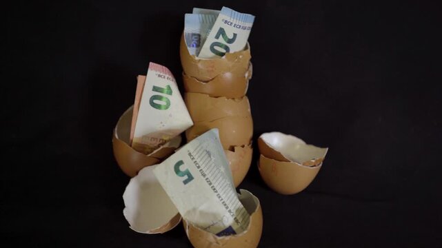 Euro Banknotes and Eggshells in a Food Budget Concept