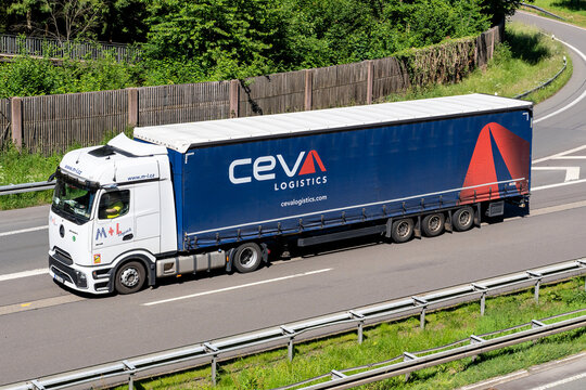 Wiehl, Germany - May 26, 2026: M+L Logistik Mercedes-Benz Actros truck with CEVA curtainside trailer on motorway
