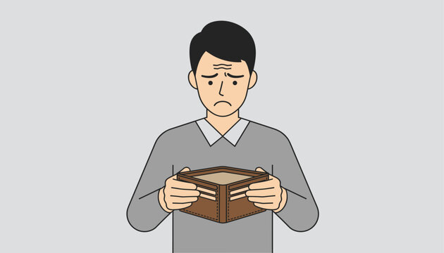 Upset man staring down with worry and concern at his empty wallet held in his hands indoors.