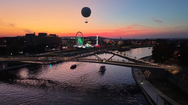 Sunset aerial view of Kazimierz-Ludwinow (Anawa) Footbridge in Krakow, Poland