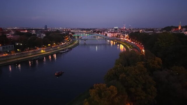 Evening aerial view of Vistula River bridges in Krakow city, Poland
