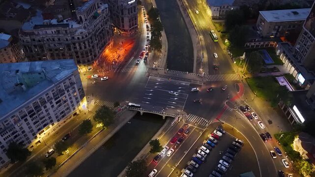 Night aerial view of Natiunile Unite Bridge over Dambovita River, Romania