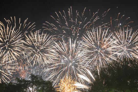 Fireworks filling the whole night sky above a metal music festival in Clisson, France