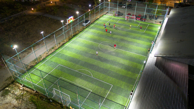 Aerial View of Soccer Match at Night