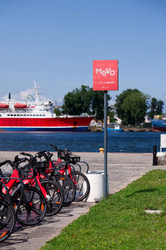 Bike-sharing station for red MEVO shared bicycles and electric bikes manufactured by Segway, convenient and sustainable urban transportation on July 24, 2026 in Sopot, Poland.